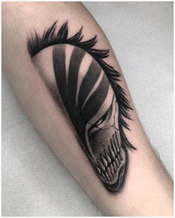 Hollow Mask Forearm Tattoo